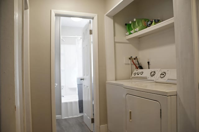 laundry room featuring washer and dryer and laundry area