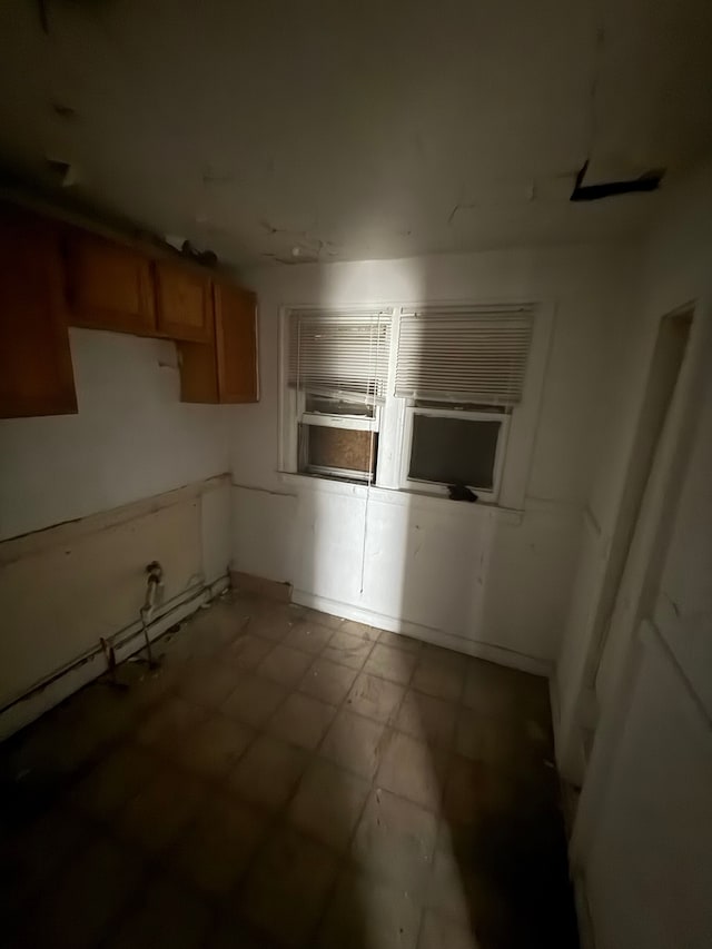 kitchen featuring brown cabinets