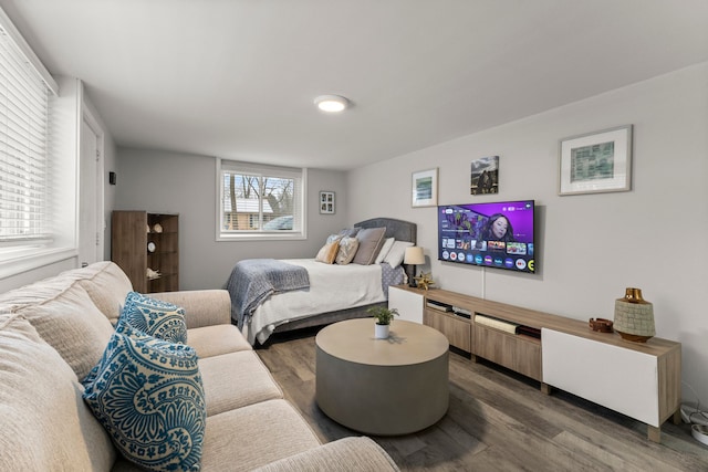 bedroom with wood finished floors