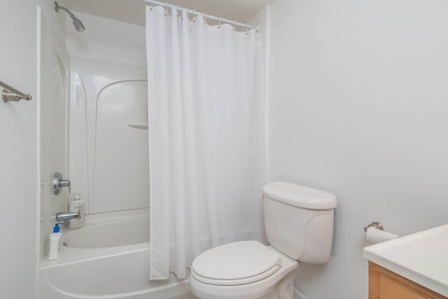 full bath with toilet, vanity, and shower / bath combination with curtain