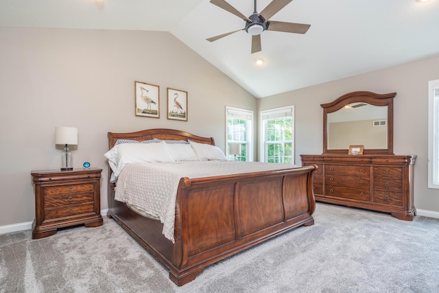 bedroom with visible vents, baseboards, lofted ceiling, ceiling fan, and light carpet