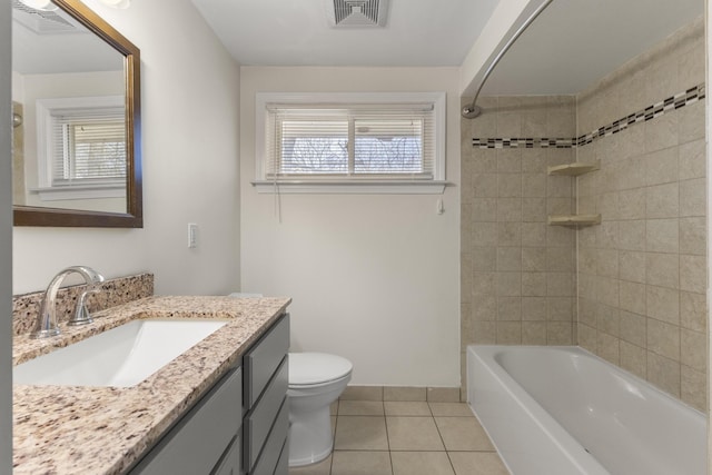 full bathroom featuring vanity, tile patterned floors, toilet, and visible vents