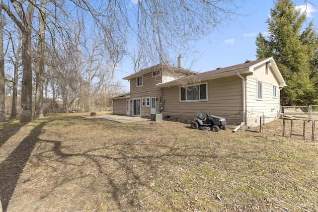 back of house featuring a patio area, cooling unit, and fence