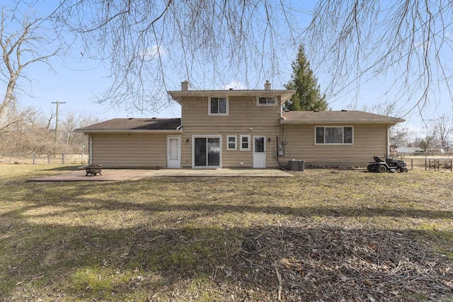 back of house featuring a patio area, fence, and central AC