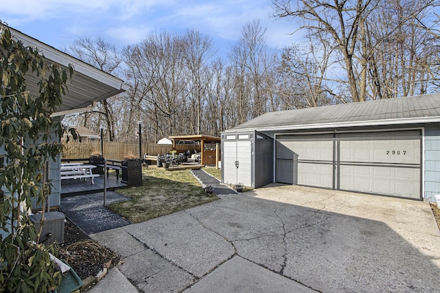 detached garage with fence