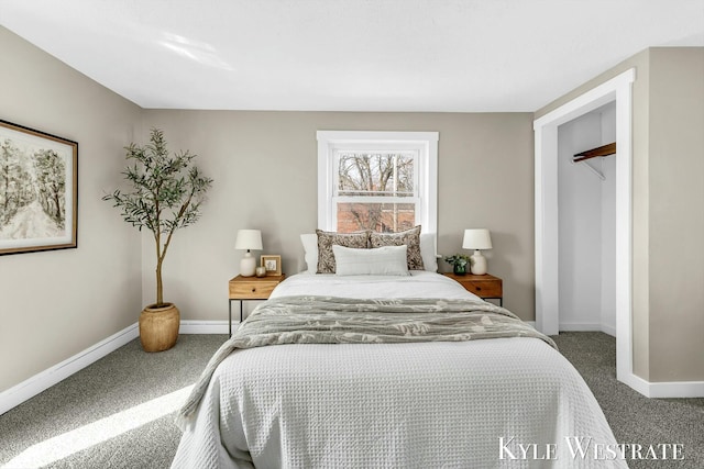 bedroom featuring carpet and baseboards