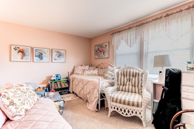 bedroom with light colored carpet