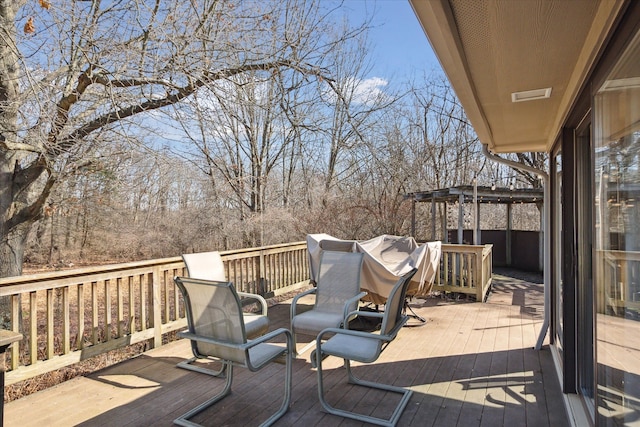 deck featuring a pergola