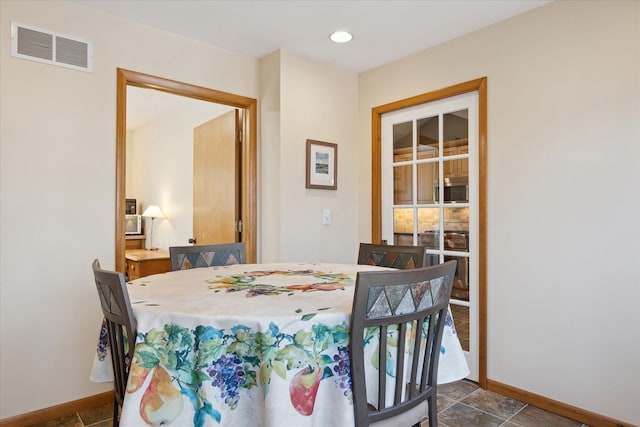 dining area featuring visible vents, recessed lighting, and baseboards