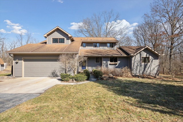 view of front of house featuring an attached garage, concrete driveway, and a front yard