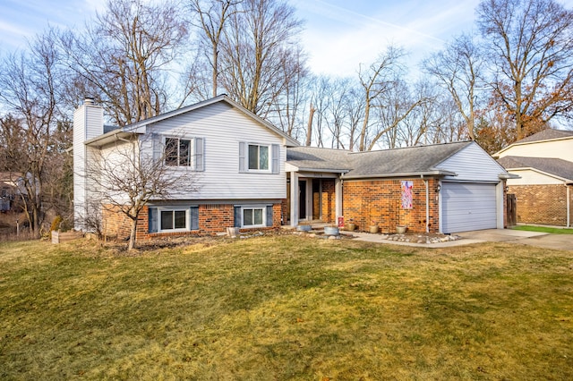 split level home with brick siding, a front lawn, concrete driveway, a chimney, and an attached garage