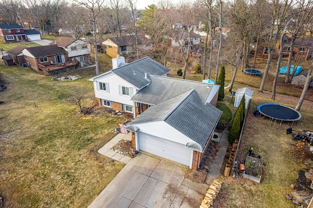 birds eye view of property with a residential view