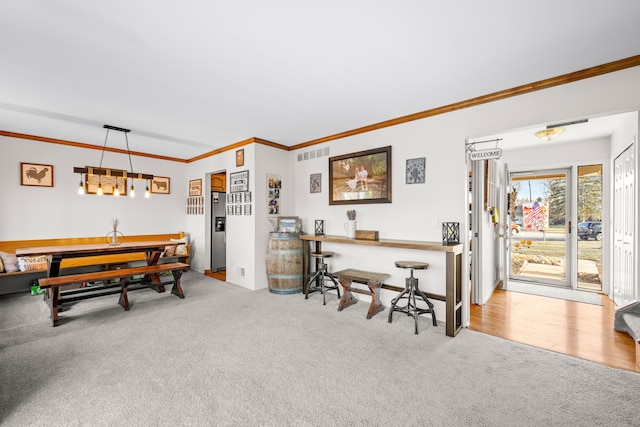 interior space with visible vents and crown molding