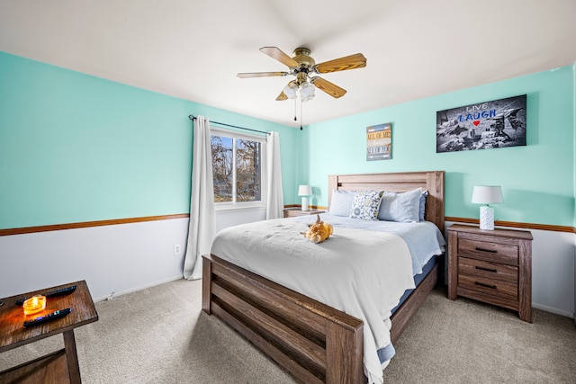 bedroom featuring carpet, baseboards, and ceiling fan