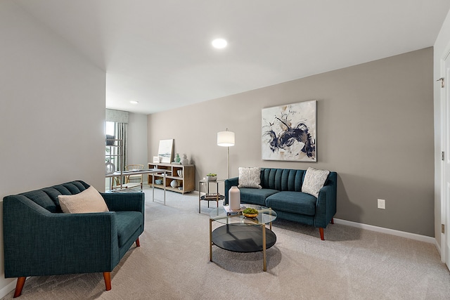 living area featuring carpet flooring, recessed lighting, and baseboards