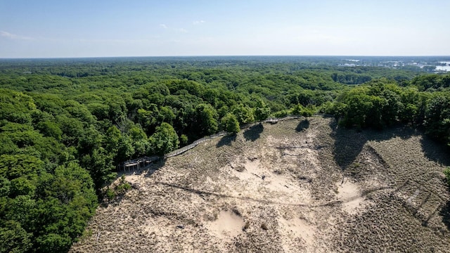 aerial view featuring a view of trees