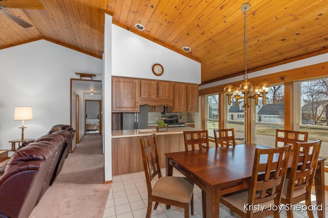 dining area featuring a wealth of natural light, high vaulted ceiling, wood ceiling, and light tile patterned floors