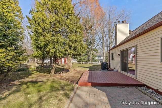 deck featuring a yard