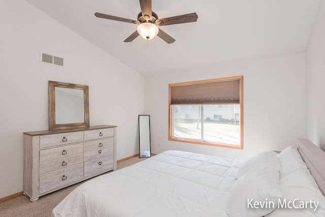 bedroom featuring lofted ceiling, light colored carpet, visible vents, and baseboards