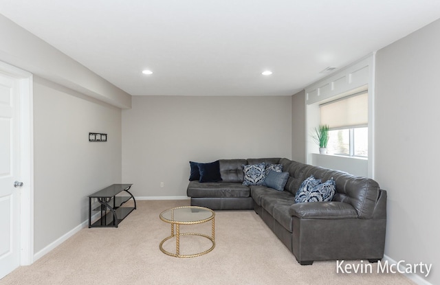 living room featuring visible vents, recessed lighting, baseboards, and carpet