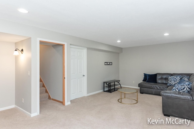 living area featuring recessed lighting, stairs, baseboards, and carpet floors