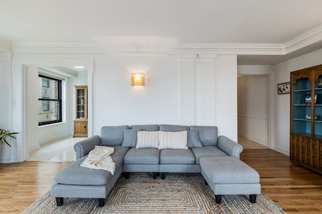 15 E Kirby St Unit 1104, Detroit, MI 48202 - living room with ornamental molding, wood finished floors, and baseboards