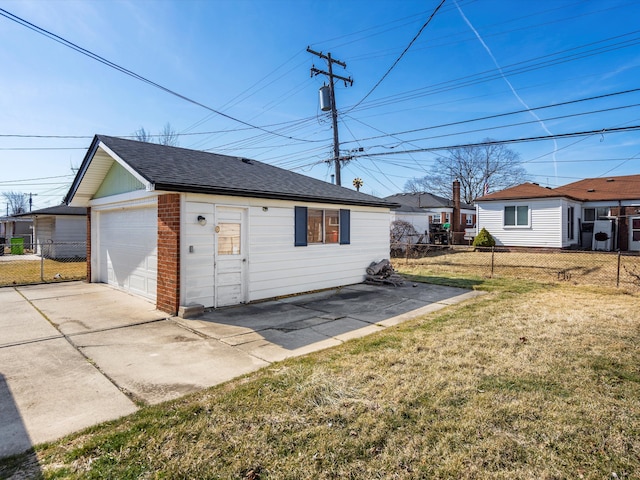 garage with fence