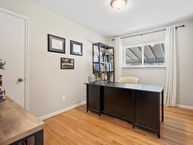 office featuring light wood finished floors and baseboards