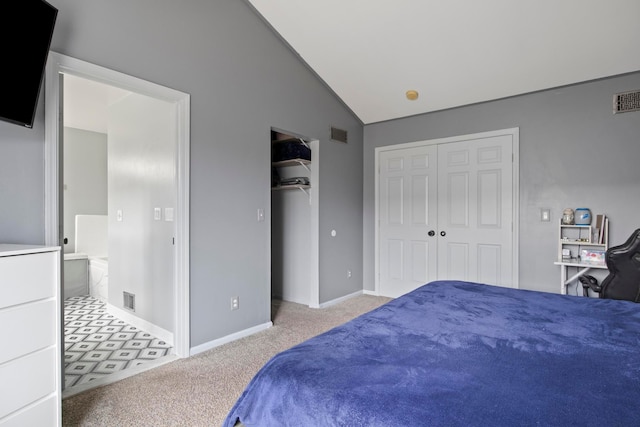 bedroom with visible vents, baseboards, lofted ceiling, and carpet