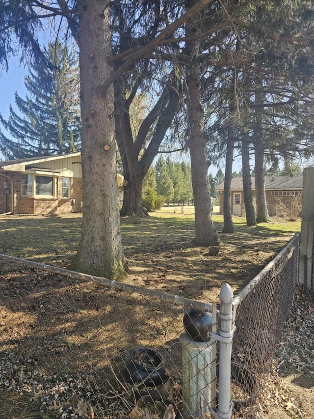 view of yard with fence