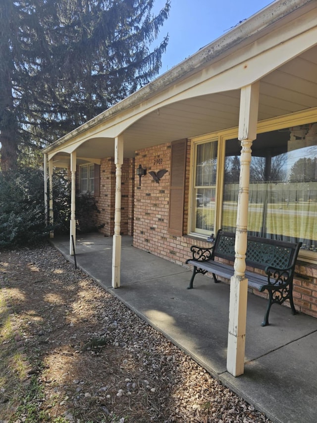 view of patio featuring a porch