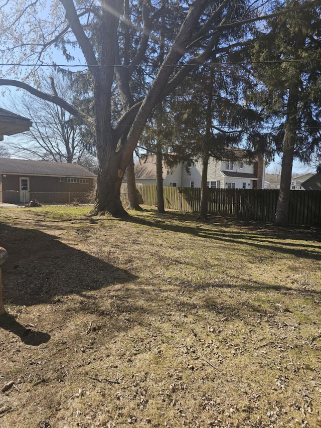 view of yard with fence