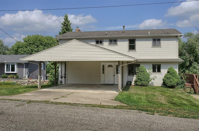 view of front of house featuring an attached carport, a front yard, and a chimney