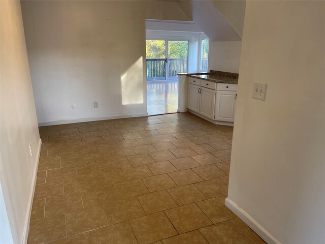 empty room with baseboards