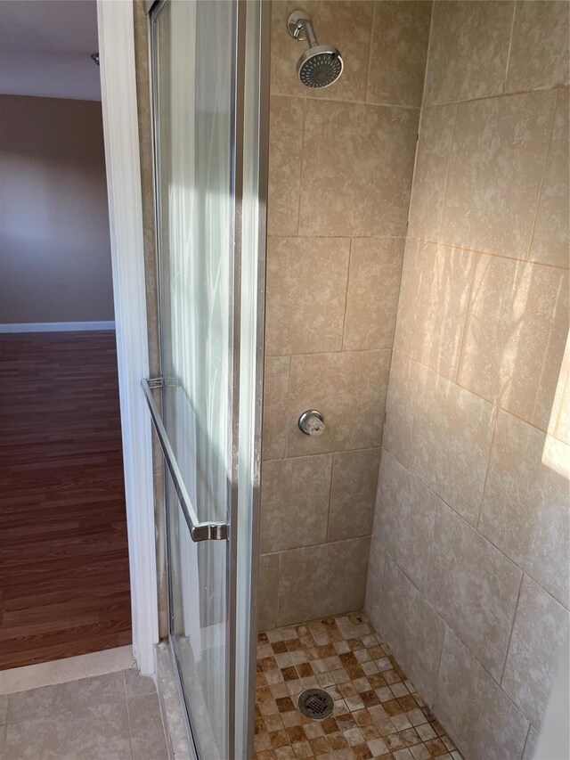 bathroom with a stall shower