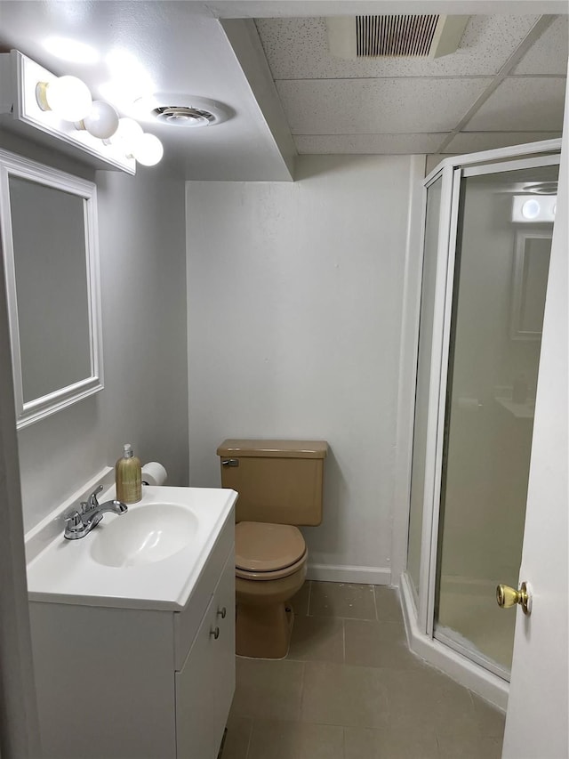 full bathroom featuring tile patterned floors, visible vents, a shower stall, and vanity