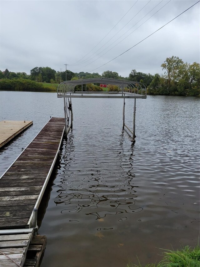 dock area featuring a water view