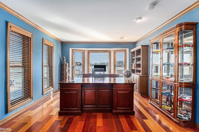 office with dark wood finished floors and ornamental molding