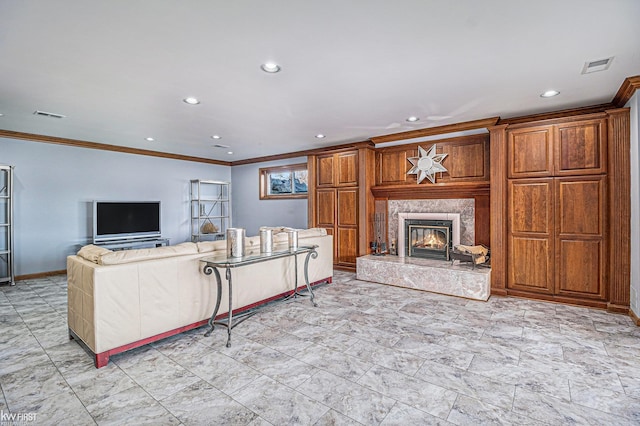 living room with recessed lighting, a fireplace, visible vents, and ornamental molding