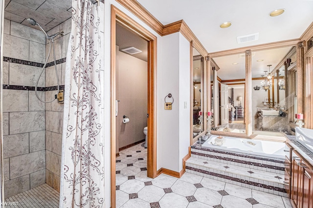 bathroom with visible vents, baseboards, a shower stall, a garden tub, and toilet