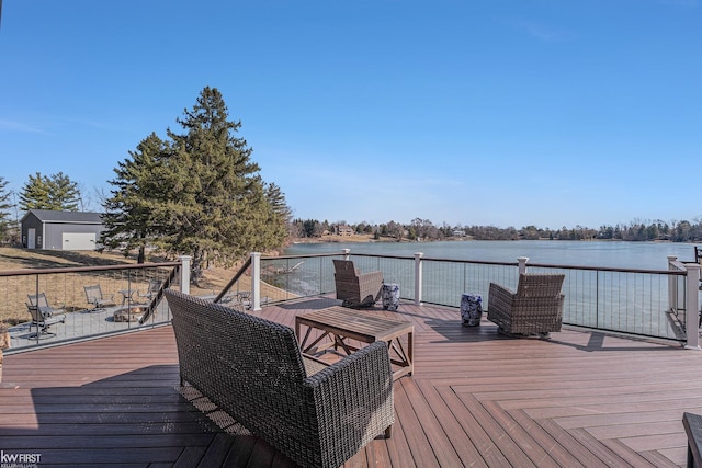 wooden terrace with a water view