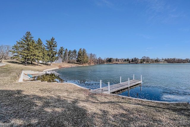 view of dock with a water view