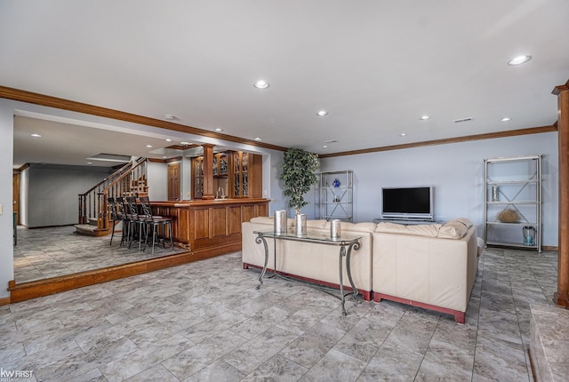 living area featuring recessed lighting, a bar, stairs, and crown molding