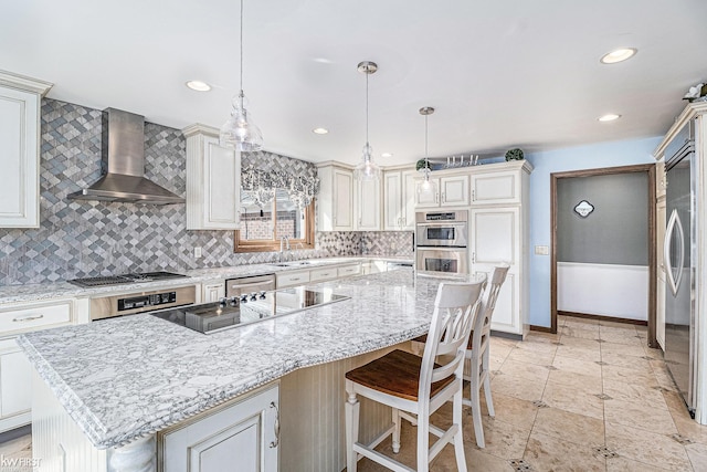 kitchen featuring a center island, decorative light fixtures, decorative backsplash, stainless steel appliances, and wall chimney exhaust hood