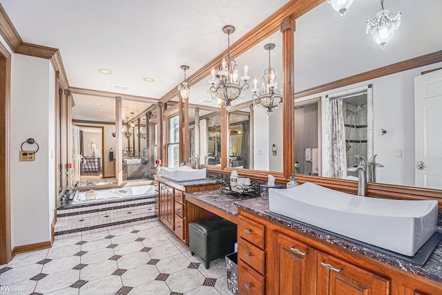 bathroom with a chandelier, visible vents, a washtub, and crown molding