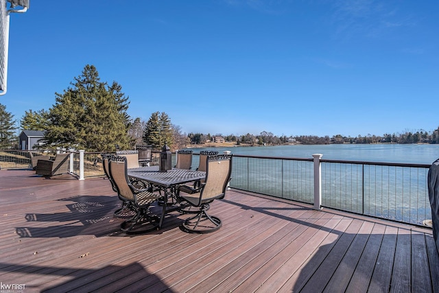 deck featuring a water view