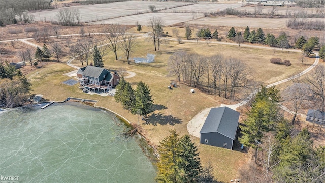 birds eye view of property with a rural view