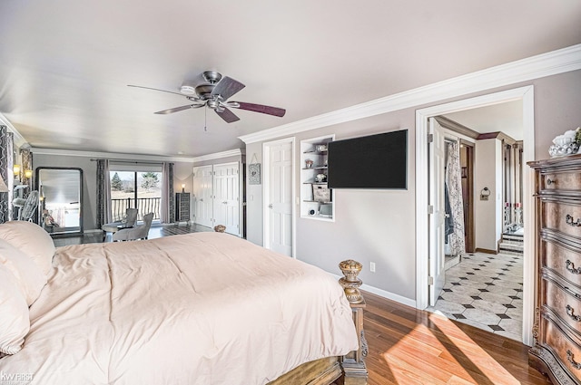 bedroom featuring wood finished floors, baseboards, ceiling fan, access to exterior, and crown molding