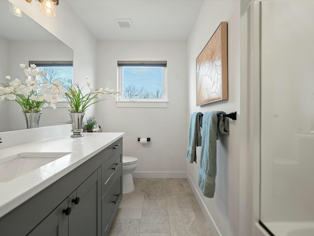 bathroom featuring visible vents, walk in shower, baseboards, toilet, and vanity