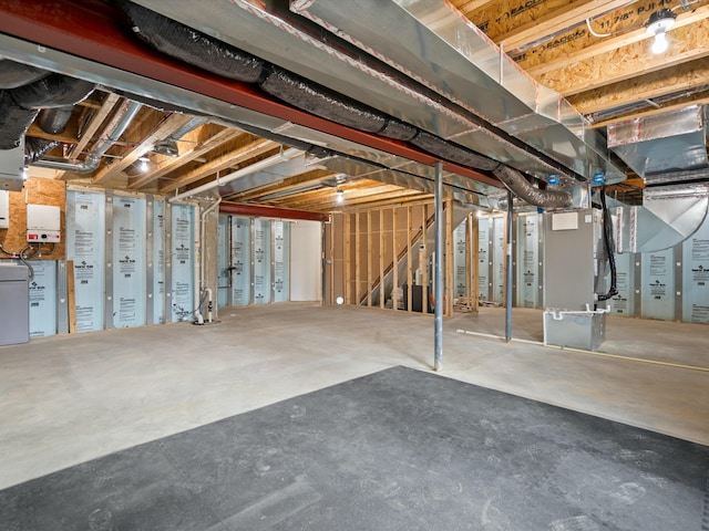 unfinished basement with heating unit